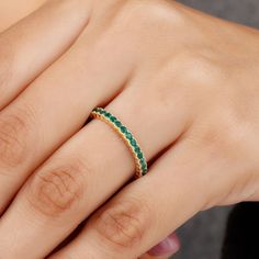 Product Details We know how Jewelry works charm for all our lovely ladies out there and so we bring this Gorgeous Eternity Ring for all our ladies who never go out of style. This Emerald Eternity Ring with Beaded Bezel Details is a must have Eternity Ring for all those special occasions, be it your Engagement, or a beautiful Valentine date night, this gemstone Ring will definitely charm everything up, so grab it now. Product Information SKU SHP-RINGS042165859 Width 1.8 mm Height 2.4 mm Weight 2.