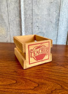 a wooden box sitting on top of a table