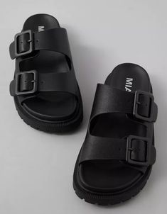 MIA Gen Sandal Black Adjustable Slides With Buckle Closure, Black Slides With Adjustable Strap For Vacation, Trendy Double Strap Synthetic Slides, Black Slides With Adjustable Strap For Summer, Adjustable Strap Slides For Spring, Black Double Strap Slides For Summer, Trendy Synthetic Double Strap Slides, Adjustable Slides For Spring, Adjustable Straps Slides For Spring