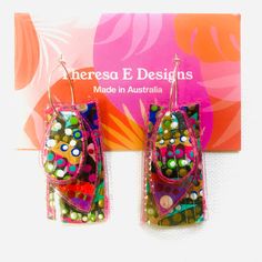 Handcrafted Canvas Earrings.  Hand Painted in Original Design.  Lightweight. Silver Hoops. Plastic Protective Cover.  Free Postage Artsy Multicolor Rectangular Earrings, Funky Multicolor Earrings For Parties, Colorful Party Earrings With Ear Wire, Artsy Multicolor Earrings For Party, Green Artsy Earrings For Party, Multicolor Rectangular Earrings For Party, Artsy Green Earrings For Party, Plastic Bottle Earrings, Canvas Earrings