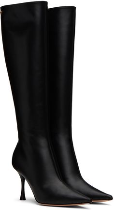 Calf-high buffed leather boots in black. · Pointed toe · Logo hardware at collar · Zip closure at inner side · Buffed leather lining · Stiletto heel with rubber injection · Leather sole · Heel: H3.25 in Supplier color: Black Business Boots With Rubber Heel Cap And Pointed Toe, High Heel Calf Leather Knee-high Boots, Calf Leather Knee-high Boots With High Heel, High Heel Knee-high Calf Leather Boots With Leather Lining, Black Knee-high Calf Leather Heeled Boots, Calf Leather High Heeled Boots With Rubber Cap, Classic Knee-high High Heel Boots With Leather Sole, Calf Leather Platform Boots With Almond Toe For Work, Calf Leather Knee-high Boots With Reinforced Heel