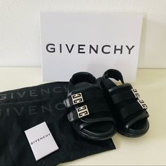 100% Authentic, New With Box And 2 Dust Bags. Size 36 Us 6 Sandals In Suede And Smooth Calfskin Leather. Color: Black. Wide Strap With Hook-And-Loop Fastened Closure Featuring Two 4g Metal Buckle Straps On The Front. Canvas Strap With Givenchy Leather Reinforcement On The Back. Light And Comfortable Thick Sole. Givenchy Signature In Relief On The Back. 4g Emblem Engraved On The Side. Luxury Slingback Strap Sandals, Designer Black Sandals With Adjustable Strap, Black Designer Sandals With Adjustable Strap, Designer Black Sandals With Logo Strap, Luxury Black Sandals With Adjustable Strap, Luxury Slingback Sandals With Adjustable Strap, Luxury Formal Sandals With Adjustable Strap, Black Sandals With Logo Strap For Summer, Luxury Black Sandals