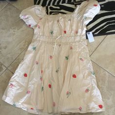 Saint Gealdine Cotton Poplin Embroidered Insect And Strawberry Print Dress Size Xxl Brand New Stretch Smocking On Back Of Waist Equates To Us Size 16 Brand New Size Xsmall Small Medium Large Xlarge 2xl Numeric 2 4 6 / 8 10 / 12 14 16 Bust 32 - 33 34 - 35 36 - 37 38 - 39 42 - 43 44 - 45 Waist 24 - 25 26 - 27 28 - 29.5 31 - 32.5 34 - 35.5 37 - 38.5 Hip 34 - 35 36 - 37 38 - 40.5 42 - 44 45 - 46 47 - 48 Casual Spring Dresses With Embroidery, Spring Strawberry Print Dress For Brunch, Spring Brunch Dress With Strawberry Print, Casual Floral Embroidered Dress For Spring, Casual Spring Dress With Floral Embroidery, Casual Floral Embroidery Dress For Spring, Casual Strawberry Print Dress For Brunch, Strawberry Print Dress For Spring Vacation, Casual Strawberry Print Dress For Vacation