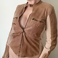 Incredible, Authentic Roberto Cavalli Class Leather Jacket Circa Early 2000's, Y2k Chic Buttery Soft Light Brown Lambskin Leather With Beige Cotton Knit. Crew Neckline With Snap Button Closure, Full Zip Closure. Multiple Zip Pockets At Front. Excellent Gently Used Condition, Structurally Sound And Wearable As Is. Two Small Holes At Shoulders As Shown. Some Faint Areas Of Natural Patina, Looks Perfectly Worn In. Italian 42, Us 8, Bust Flat 19" Sleeve Length 22" Shoulders Across 18" Full Length 25" Please View All Details Before Purchasing, All Items Sold As Is. Buyer Is Responsible For Viewing All Photos And Reading Descriptions Before Purchase. Reasonable Offers Always Welcome! Check Luxury Vintage Brown Biker Jacket, Luxury Classic Distressed Brown Biker Jacket, Brown Vintage Biker Jacket With Zipper Closure, Luxury Vintage Distressed Brown Leather Jacket, Roberto Cavalli Jacket, Lambskin Leather Jacket, Roberto Cavalli, Tan Brown, Lambskin Leather