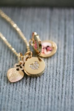 Delight your sweetheart with a one of a kind Mini 'Sweetheart' Locket. Embellished with sparkling diamonds and the finest 18k gold, it's the perfect starter piece of jewelry to become a treasured keepsake. Completely timeless and divinely crafted, it will add a sophisticated dash of sweetness to their collection. Diamond Double Heart Necklace For Anniversary, Luxury Heart Charm Necklace For Wedding, Fine Jewelry Double Heart Charm Diamond Necklace, Fine Jewelry Double Heart Diamond Necklace With Charm, Fine Jewelry Diamond Necklace With Heart Charm, Luxury Valentine's Day Jewelry With Diamond Accents, Luxury Yellow Gold Diamond Necklace With Heart Charm, Charm Heart Pendant Jewelry For Weddings, Heart Pendant Charms Jewelry For Wedding