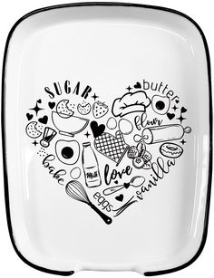 a white plate with black trim and an image of a heart shaped design on it