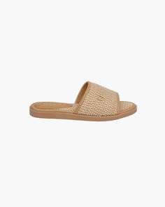 A women’s summer sandal for sale on line which is comfortable, lightweight and durable. This slip on casual style will literally coordinate with everything in your summer day wardrobe. The neutral ,”Peanut” shade row on row stitched raffia straw ,(Squishee®) on the vamp and padded footbed is the same one used for many Javits hats and bags. The generous vamp, designed to grab your foot, is lined with soft leather. The rubber bottom, 3/4” high at the heel and 1/2” in the front is lightly treaded f Casual Flip Flops With Textured Sole For Beach, Casual Flip Flops With Textured Sole For Vacation, Natural Espadrilles With Textured Footbed For Vacation, Beige Slides With Cushioned Footbed For Vacation, Comfortable Sandals With Textured Footbed In Natural Color, Comfortable Sandals With Textured Footbed, Casual Flip Flops With Woven Sole For Summer Outings, Beach Flip Flops With Cork-bed Midsoles, Comfortable Beige Slides With Woven Sole