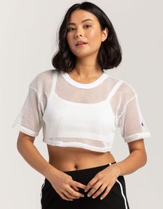 Champion Mesh Cropped Tee. Crafted From Lightweight Mesh, This Cropped T-Shirt Is All About Merging Sporty Aesthetics With Modern Style. Lightweight And Perfect For Warm Days. Its Loose Fit Ensures Maximum Comfort Whether You're In Action Or On The Go. The Iconic Champion Logo Hits The Left Sleeve Of The Cropped Tee, Adding That Signature Sporty Touch. Perfect For Workouts, Casual Hangouts, Or Flaunting Your Sporty Vibe, This Cropped Tee Is A Must-Have For Those Who Play To Win. 60% Cotton, 40% Polyester. Machine Wash. Imported. Model Is Wearing A Size Small. Model Measurements:height: 5'8" Bust: 32"waist: 25"hips: 36" Sheer Trend, Mesh Shirts, Flannel Sweatshirt, Mesh Shirt, Mesh Crop Top, Shirts Women Fashion, Champion Logo, Conscious Fashion, Open Knit Sweater