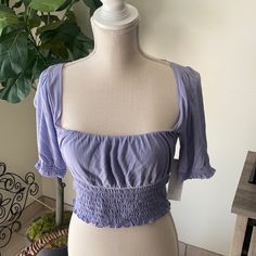 Blue Quarter Sleeve Semi Crop Top Style, With Scoop Neck, And Scrunch Sleeves And Bottom Hem.- Size Medium. Would Look So Cute With High Waisted Jeans. *Bnwt* Purple Short Sleeve Top For Brunch, Ruched Summer Top For Brunch, Trendy Ruched Purple Top, Summer Ruched Top For Brunch, Trendy Purple Ruched Top, Trendy Purple Tops For Brunch, Purple Cropped Top For Summer, Purple Summer Tops For Brunch, Fitted Ruched Blouse For Beach