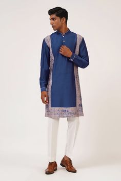 Ocean blue kurta with all over mandarin collar and contrast discharge print border. Paired with gathered churidar. - Aza Fashions Bollywood Style Straight Kurta With Printed Border, Bollywood Style Kurta With Printed Border, Traditional Indigo Kurta With Printed Motifs, Fitted Kurta With Printed Border For Festivals, Festive Kurta With Printed Border, Indigo Designer Wear Straight Kurta, Indigo Designer Straight Kurta, Designer Indigo Straight Kurta, Designer Kurta With Printed Border For Festivals