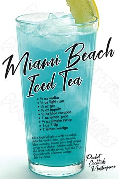 a blue drink with a lemon wedge on the rim and an ad for miami beach iced tea