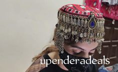 The Afghan jewelry cap is an intricate and elegant headpiece worn by Afghan women during special occasions, these caps hold deep cultural significance and celebrate the beauty of Afghan culture and craftsmanship Traditional Handmade Hat As Gift, Handmade Traditional Hat As Gift, Traditional Headpieces For Festivals, Bohemian Ceremonial Headpieces For Festivals, Bohemian Headpieces For Ceremonial Festivals, Traditional Round Crown Wedding Headpiece, Traditional Wedding Headpiece With Round Crown, Traditional Handmade Round Crown Headpiece, Traditional Ceremonial Crown Headpieces