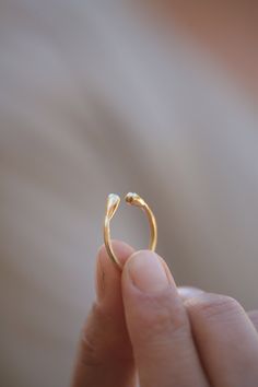 "Adjustable solid 14k yellow gold open ring. This solid gold ring has two gold teardrops - one on each side. The drops connect and bypass each other, and by so creating a gold ring in a unique teardrop shape. This ring will be made to your size - and can be worn on any finger. It can also be a great pinky ring. This ring is light and comfortable to wear and will be great for everyday use, as for fancy events. I love wearing this ring especially on my pinky ring, but it will look great no matter Adjustable Gold Ring, Minimalist Gold Ring, Unique Gold Rings, Signet Rings Women, Gold Nose Stud, Gold Jewelry Gift, Modern Jewellery Design, Ruby Ring Gold, Solid Gold Ring