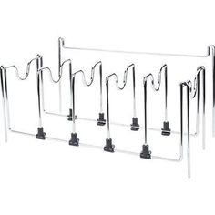 a set of six metal racks with hooks on each side and one hanging from the wall