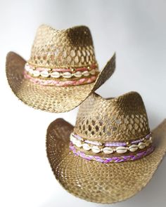 Did someone say coastal cowgirl summer??? Beach day? Country concert? Girls trip? Our handmade cowgirl hats are the PERFECT accessory for any outfit! These tan straw cowgirl hats are decorated with your choice of color ribbon, gold/silver ribbon, plain cowrie shells, & gold/silver chain. Gold Straw Hat With Curved Brim For Vacation, Gold Curved Brim Straw Hat For Vacation, Gold Straw Hat For Beach With Short Brim, Southern Style Summer Hats For Western-themed Events, Gold Short Brim Sun Hat For Beach, Gold Curved Brim Straw Hat For Summer, Gold Wide Brim Straw Hat For Summer, Adjustable Gold Straw Sun Hat, Gold Wide Brim Summer Straw Hat