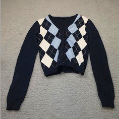 This Is A Brandy Melville Cardigan/Sweater. It Has A Blue White And Navy Argyle Design. I've Only Worn This Once To A Birthday Party But Other Than That Is It Unused. Trendy Navy Sweater For Fall, Trendy Navy Sweater For Winter, Blue Cotton Cropped Sweater For Winter, Blue Crew Neck Trendy Cardigan, Trendy Blue Crew Neck Cardigan, Preppy Long Sleeve Fall Sweater, Preppy Long Sleeve Fitted Sweater, Preppy Fitted Long Sleeve Sweater, Blue Long Sleeve Cropped Sweater For Winter