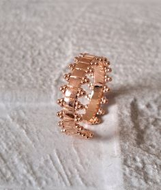 Rose gold Spike open ring band, stackable adjustable rose gold spike ring, rose gold spike ring, textured ring, open rose gold spike ring When you need that little something to finish of an outfit, this beautifully handmade and handcrafted ring will do that.  This sophisticated ring will emphasise your outfit whether you want it to look simple or totally unique.  Simple with an elegant and detailed finish to complete the look. * Rose Gold * 0.7cm - estimate, adjustable * Copper / Rose gold finis Rose Gold Stackable Open Band Rings, Rose Gold Stackable Midi Rings With Open Band, Stackable Rose Gold Midi Rings With Open Band, Stackable Rose Gold Open Band Midi Rings, Adjustable Rose Gold Ring, Adjustable Rose Gold Toe Ring, Adjustable Rose Gold Midi Rings For Promise, Elegant Rose Gold Metal Midi Rings, Elegant Rose Gold Midi Rings