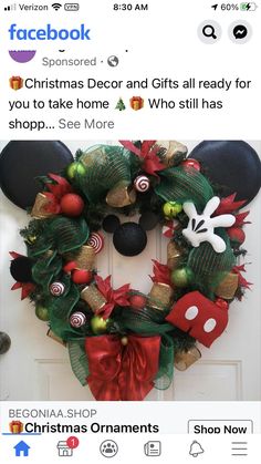 a mickey mouse christmas wreath on a door