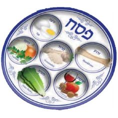 an image of a plate with different food items in hebrew writing on it, including eggs, carrots, lettuce and cucumbers