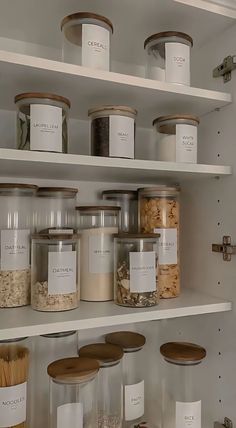 the shelves are filled with various types of spices