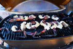 the food is being cooked on the grill