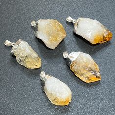 Raw Citrine Crystal Point Pendant (Silver Plated) (Please Note - This type of citrine is made from treated amethyst) These Are All Unique And Fantastic For Creating Craft And Jewelry Projects Avg Size 1 inch (Sizes Vary Slightly) You Will Receive Items Of Similar Size And Shape In The Photos -  --Simple Satisfaction-- * Your happiness is our priority, so all returns are accepted within 30 days for any reason --Enjoy!-- Citrine Pendant Crystal Necklace With Natural Stones, Citrine Healing Jewelry With Stones, Citrine Pendant Necklace With Natural Stones, Rough Gemstone Jewelry, Raw Citrine, Citrine Crystal, Rough Gemstone, Pendant Silver, Crystal Points