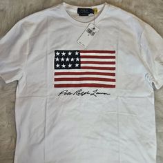 Brand New, Never Worn, With Tags, Polo By Ralph Lauren Graphic Tee Casual White Shirt With American Flag Print, White Shirt With Flag Print For Spring, White Long Sleeve T-shirt With American Flag Print, Spring White Shirt With Flag Print, Casual Long Sleeve T-shirt With Flag Print, White Cotton Shirt With American Flag Print, Casual White Tops With American Flag Print, White Casual Shirt With Flag Print, Casual White Shirt With Flag Print