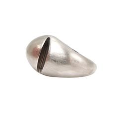 This vintage Bulgari ring is from their "Cabochon" line. Named after a cut of stone that's polished without being faceted, the top of this piece is designed to resemble an oval, cabochon gem. Two carved recesses beneath the top add a further sense of three dimensional art, and the wide shank tapers from 14mm to 3.5mm. The inside of the ring is deeply engraved with "BVLGARI" in graduated lettering. Stamped "585" in a diamond, which is the hallmark for 14 karat gold. DETAILS ____________________ M Classic Domed Cabochon Signet Ring, Vintage Domed Rings With Polished Finish, Vintage Oval Dome Ring With Polished Finish, Classic Oval Cabochon Dome Ring With Polished Finish, Modern Oval Cabochon Dome Ring, Oval Cabochon Dome Ring With Polished Finish For Anniversary, Modern Domed Cabochon Rings, Modernist Dome Ring With Polished Finish, Polished Modernist Dome Ring