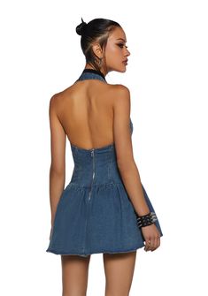 This mini dress has a denim construction, a halter neckline with an adjustable buckle closure, paneling, cut out details, and a back zipper closure. Denim Blue Summer Club Dress, Blue Mini Dress With Zipper Closure, Summer Denim Mini Dress For Club, Spring Blue Denim Club Dress, Back Zipper Mini Denim Dress, Blue Denim Club Dress, Fitted Blue Backless Denim Dress, Fitted Backless Blue Denim Dress, Fitted Blue Denim Backless Dress