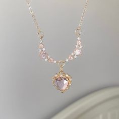 Sweet Pink Crystal Heart Pendant Necklace This adorable necklace features a sweet pink crystal heart pendant that will add a touch of cuteness to any outfit. Perfect for showing off your feminine side and spreading love wherever you go. Makes a thoughtful gift for someone special or a lovely addition to your own collection. Pink Necklace Aesthetic, Pink Ethereal, Pink Diamond Necklace, Pink Necklaces, Birthday Lights, Crystal Heart Pendant, Pink Necklace, Pink Diamond, Crystal Heart