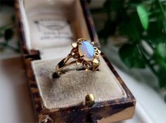 A TRULY LOVELY VINTAGE RING A Gorgeous Opal Set in a superb Solid 10k Gold Setting Marks for genuine 10k Opal is 8x6mm Size UK N Size USA 7 RESIZING AVAILABLE Wedding Ring With Opal Accents, Vintage Oval Moonstone Ring Hallmarked, Vintage 14k Gold Opal Ring, Vintage Opal Ring In 14k Gold, Antique 14k Gold Opal Ring For Anniversary, Vintage Opal Ring Gift, Victorian 14k Gold Moonstone Wedding Ring, Vintage 14k Gold Hallmarked Opal Ring, Vintage Hallmarked 14k Gold Opal Ring