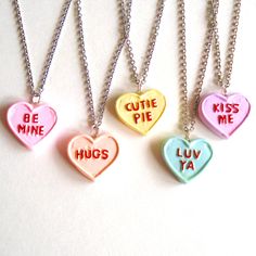 When you think of Valentine's Day, you have to think conversation hearts and I made these necklaces to look just like the real candies! Each conversation heart charm was handmade by me with great attention to detail from polymer clay. These are about 1" long each and are hand painted with classic sweet messages. Choose your favorite from the drop down menu. Each charm will be glazed for durability and hung on a 18" hypoallergenic stainless steel chain. **do not store in direct sunlight**Made to Candy Messages, Valentines Day Necklace, Candy Necklace, Pastel Candy, Conversation Heart, Candy Necklaces, Sweet Jewelry, Conversation Hearts, Resin Ideas