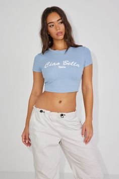 Stormi Tee, Ashley Blue with "Ciao Bella" Art Basic Ribbed Cropped T-shirt For Summer, Casual Stretch Cropped T-shirt, Casual Cropped Seamless T-shirt, Fitted Short Sleeve Crop Top With Ribbed Neckline, Fitted Crop Top With Ribbed Neckline And Short Sleeves, Trendy Fitted T-shirt With Ribbed Neckline, Spring Cropped Tops With Ribbed Neckline, Basic Ribbed Cropped T-shirt, Sporty Crew Neck Crop Top For Spring