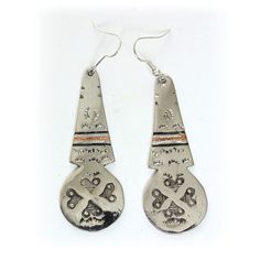 Tuareg silver Earrings. Pierced style dangling earrings made by the Tuareg people. The inlay is etched onto genuine silver, and is truly unique. The Tuareg are known for their fine craftsmanship in the field of jewelry, especially silver. 2" long Made in Mali. J-E050 African Jewelry Earrings, Tuareg People, African Jewelry, Dangling Earrings, The Field, Silver Earrings, Dangle Earrings, Handmade Jewelry, Jewelry Earrings