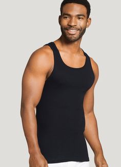 Essential under sweaters, flannels and dress shirts, the legendary Jockey® 100% Cotton Big Man A-Shirt Tank just got even better, now with 100% combed cotton for lasting softness and good looks. The comfy rib knit is enhanced with StayNew technology to reduce pilling and fading so it looks and feels new, whiter and brighter, wash after wash. | Jockey® 100% Cotton Big Man A-Shirt Tank - 3 Pack in Black Classic Solid Color Crew Neck Tank Top, Classic Tank Top For Layering, Classic Black Cotton Tank Top, Classic Black Loungewear Tops, Jockey Mens, Mens Undershirts, Male Makeup, Big Men, Fit Inspo