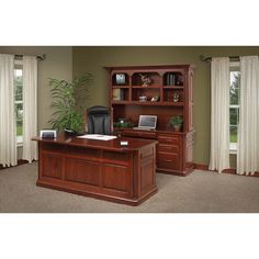 an executive desk with hutch and bookcase