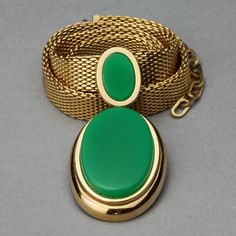 Features: - 100% Authentic CHRISTIAN DIOR. - Flat chain necklace with double oval green pendant. - Gold tone hardware. - Signed 1971 CHR DIOR GERMANY. - Adjustable lobster closure. - Excellent vintage condition. Measurements: Pendant Height: 2.36 inches (6 cm) Wearable Length: 15.94 inches until 18.70 inches (40.5 cm until 47.5 cm) **This necklace will be shipped via DHL Express with tracking number. Please convo me for any queries and additional photos. Thank you for visiting. Other Fees that b Vintage Green Oval Necklace, Retro Green Oval Jewelry, Flat Chain Necklace, Green Pendant, Green Pendants, Pendant Gold, Dhl Express, Christian Dior, Favorite Jewelry