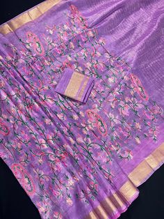 Gorgeous Lavender Color Organic Linen Silk Saree with Floral Embroidery Work. Saree has small Zari borders. Please note - The compete Saree does not have Embroidery Work to keep the saree light weight . Please check pictures in the listing showing depicting the same before purchase Item : SareeColor : Lavender Base Fabric : Organic Linen Silk Blouse piece : Comes with un-stitched Blouse piece.Blouse material : Organic Linen Silk Fall & Edging : Comes with Fall and edging (Pico) doneDisclaimer -: Linen Silk Saree, Embroidery Work Saree, Saree Floral, Floral Saree, Lavender Floral, Linen Saree, Silk Linen, Blouse Material, Organic Linens