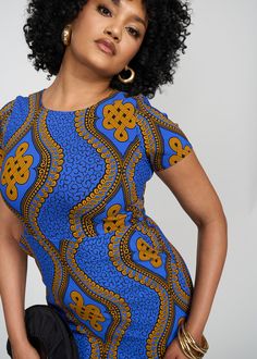 Style#: 1059/P1059 Be sophisticated queen, in this Sabella Women's African Print Stretch Dress in our Gold Blue Motif print! The above-knee length and crewneck give coverage making the perfect versatile dress to be worn from the office to a night out. Description Stretch Woven Fitted Dress Crew Neck Above Knee Length Invisible Zipper with Hook and Eye at Center Back 2 Pockets at Sides 72% Rayon/ 24% Nylon/ 4% Spandex Designed in the USA, imported Length Range: 33 1/2" - 35 1/2" Care Instructions African Attire Dresses, African Print Dresses, Dress Gold, Versatile Dress, African Style, Print Dresses, Versatile Dresses, African Attire, Stretch Dress