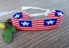 Loom beaded bracelet with Liberia flag. Patriotic hand woven beaded wristbandt is a great gift for a women, girl or child for birthday, Christmas, Valentine's Day and other holidays. Small frienship gift whis African country flag. Is suitable for daily wear. Bracelets in stock and ready to ship. More bracelets here: https://www.etsy.com/shop/BeadSeeShop?ref=seller-platform-mcnav&section_id=30144819 The bracelet is made of Czech seed beads and strong nylon thread. Width 18mm (0.7 inch) The length Adjustable Bracelets For Beach And 4th Of July, Adjustable Beach Bracelets For 4th Of July, Handmade Round Beads Jewelry For Independence Day, Handmade Jewelry With Round Beads For Independence Day, Summer Woven White Beaded Bracelets, Summer White Woven Beaded Bracelets, Patriotic Handmade Adjustable Bracelets, Handmade Adjustable Patriotic Bracelets, Handmade Adjustable Patriotic Bracelet