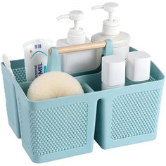 a blue caddy with soap, toothbrushes and other bathroom items in it