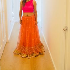 Pink Lehenga Skirt.Beautiful Sequin Work 5 M Flair . Worn 4 Times. Will Need Dry Cleaning Due To Dirt At The Bottom. Length - 39inch Waist - 27 Inch Fitted Saree Skirt For Reception, Bollywood Style Summer Festive Skirt, Summer Festive Bollywood Skirt, Fitted Orange Maxi Skirt For Party, Bollywood Party Skirt With Sheer Dupatta, Traditional Party Skirt With Sheer Dupatta, Fitted Long Skirt For Reception, Bollywood Style Skirt With Sheer Dupatta, Party Flared Skirt With Pallu