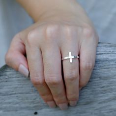 Sideway cross ring is made from 925 Sterling silver. Wear it alone or stack it with other words and symbolsThis ring is handmade and hand cast, each one is a little bit one of a kind and will never be 100% exact.Gift box included.For more information please read our policies.Thank you so much visiting and hope you enjoy shopping with us!!Pitchanan Minimalist Sterling Silver Cross Ring, Minimalist Silver Cross Rings, Adjustable Cross-shaped Ring For Anniversary, Minimalist Cross Ring For Anniversary, Adjustable Cross-shaped Promise Ring, Minimalist Adjustable Cross Ring, Sterling Silver Cross Ring For Promise, Adjustable Cross Rings With Spiritual Style, Adjustable Cross Shaped Spiritual Rings