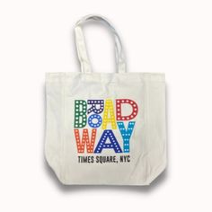 Made of quality cotton material, our durable canvas BROADWAY, TIMES SQUARE, NYC tote bag will put your love of all things Broadway front and center! It features a screen printed design on white cotton. White Square Canvas Bag For Daily Use, Large White Canvas Bag For Everyday Use, Large White Everyday Canvas Bag, Casual White Canvas Bag For Daily Use, White Logo Print Shopping Bag, Travel Canvas Tote Bag With Logo Print, Rectangular Canvas Bag For Travel With Logo Print, Trendy White Square Canvas Bag, Rectangular Logo Print Canvas Travel Bag