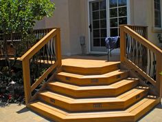 a set of wooden steps leading to a patio