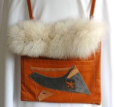 "Unique item, made of real leather and fox fur.  Inside is lined with silk.   Approximate size 10.5\" wide, 10\" height and the strap is 47\" long. Article unique, fait de cuir véritable et fourrure de renard.  Intérieur doublé avec soie. Taille approximative de 27cm de largeur, 25cm de hauteur et la ganse 119 cm." Winter Leather Shoulder Bag With Faux Fur Lining, Brown Sheepskin Bags For Winter, Hair Towel Wrap, Fur Purse, Denim Purse, Towel Wrap, Made Of, Hair Towel, Wet Hair