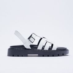 Nwt. Zara White/Black Leather Treaded Sole Low Heel Fisherman Sandals With Side Buckle Fastening. Airfit. Flexible Technical Latex Foam Insole, Designed To Offer Greater Comfort. Sole Height: 2,5 Cm. / 1″. Size 9. Ref. 1616/810. Sh 20 White Leather Slingback Sandals With Round Toe, Chic White Sandals With Buckle Closure, White Closed Toe Slingback Sandals With Cushioned Footbed, White Cushioned Slingback Sandals With Closed Toe, White Slingback Sandals With Buckle For Vacation, White Sandals With Buckle Closure For Spring, Chic White Slingback Sandals With Round Toe, Casual White Leather Slingback Sandals, White Closed Toe Slingback Sandals With Buckle