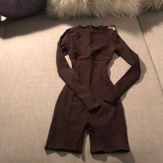 Chocolate Brown Long Sleeve Shorts Jumpsuit With Ribbed Fabric. New, Never Worn, Tag Attached. Brown Fitted Long Sleeve Jumpsuits And Rompers, Fitted Brown Jumpsuit With Long Sleeves, Fitted Long Sleeve Brown Jumpsuit, Brown Long Sleeve Jumpsuits For Night Out, Long Sleeve Short Jumpsuit, Wardrobe Brown, Mesh Romper, Shorts Jumpsuit, Cami Jumpsuit