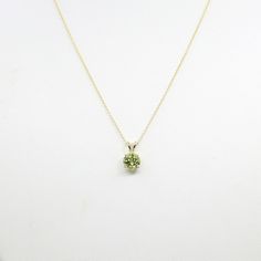 ◈ Diamond Fine Jewelry ◈ ♥ This stunning necklace features 7 mm AAA Natural Peridot. This high quality Peridot can be beautifully set in a solid 14k Yellow gold. This Necklace is perfect for everyday use and can be a lovely gift for any occasion! ♥ ◈ Item Details ◈ --- Handmade in United States --- Made to Order --- Metal: Solid 14K Gold ( White, Rose, Yellow Gold ) --- Pendant Size :12 x7 mm --- 100% Real Natural Peridot --- Stone Size : 7 mm --- Stone Shape : Round --- Total Carat Weight: Appr Dainty Diamond Band, August Birthstone Necklace, Peridot Pendant, Solitaire Necklace, Peridot Necklace, Peridot Stone, August Birthstone, Solitaire Necklaces, Rose Yellow