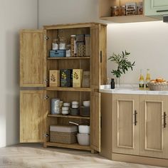 an open cabinet in the corner of a kitchen